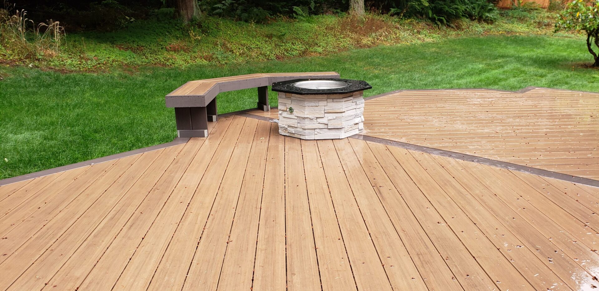 Composite deck with fire pit