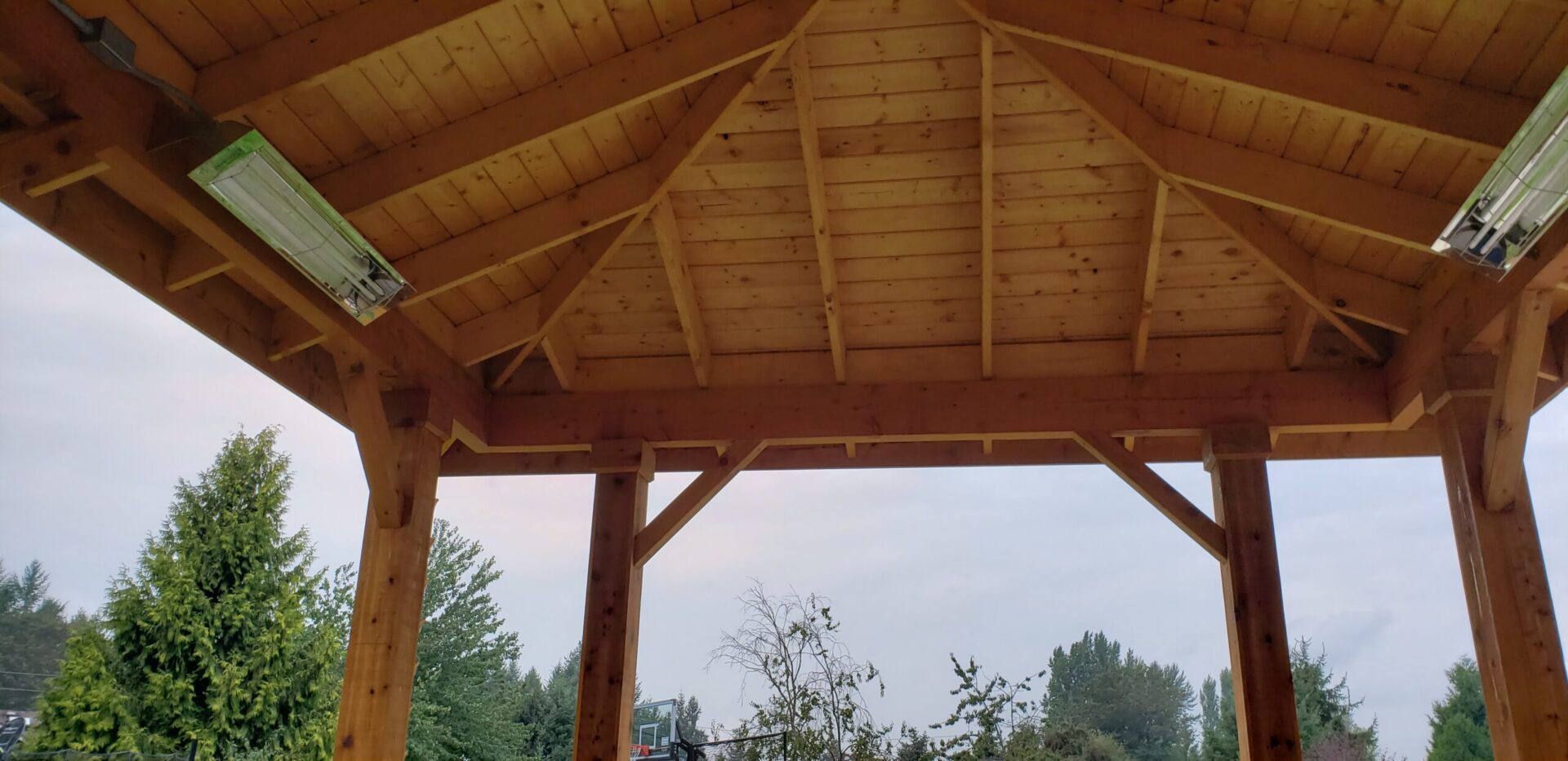 a wooden pergola covering an area